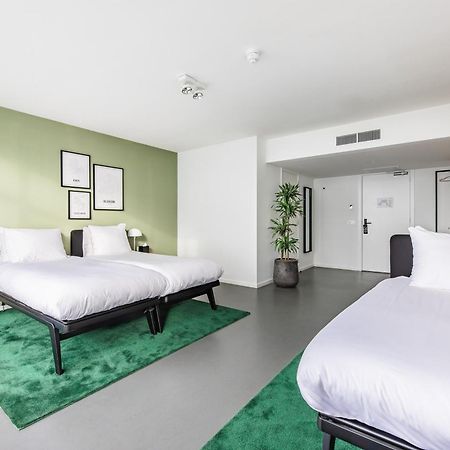 Gooiland Hotel ฮิลเวอร์ชุม ภายนอก รูปภาพ