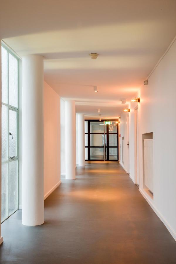 Gooiland Hotel ฮิลเวอร์ชุม ภายนอก รูปภาพ
