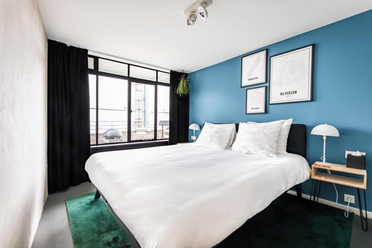 Gooiland Hotel ฮิลเวอร์ชุม ภายนอก รูปภาพ