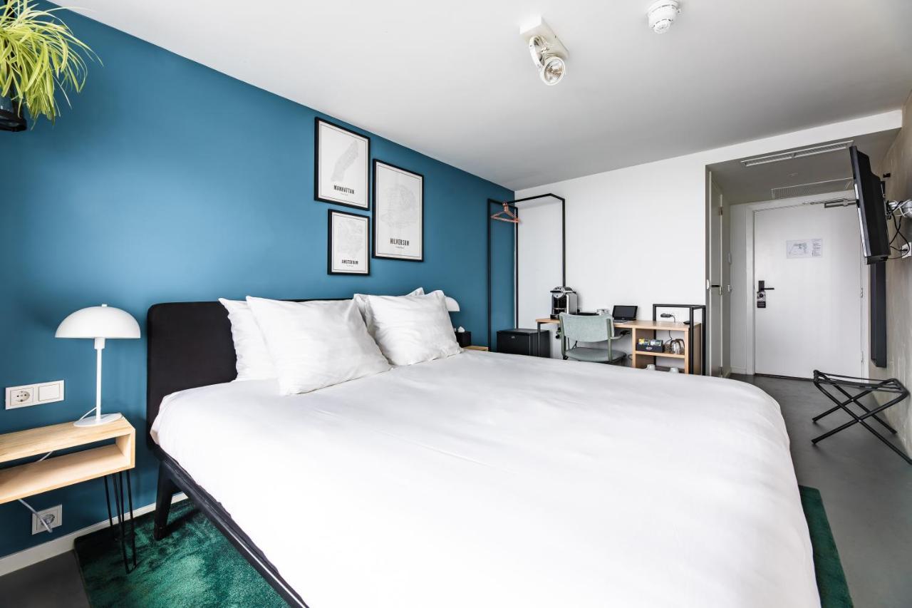 Gooiland Hotel ฮิลเวอร์ชุม ภายนอก รูปภาพ