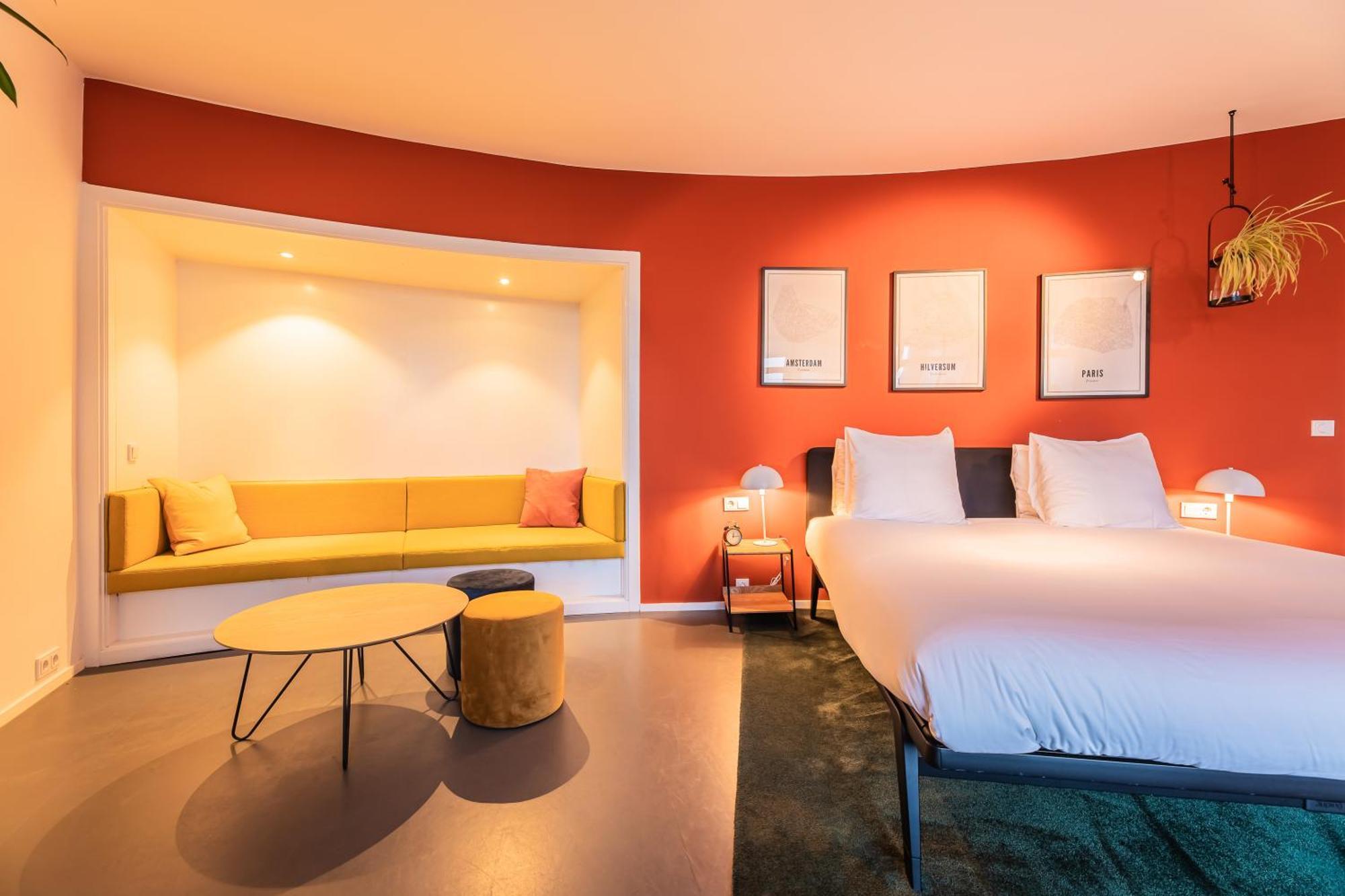 Gooiland Hotel ฮิลเวอร์ชุม ภายนอก รูปภาพ