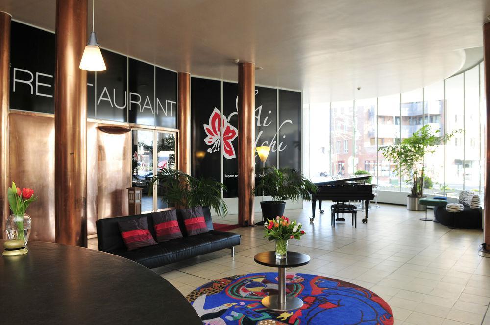 Gooiland Hotel ฮิลเวอร์ชุม ภายนอก รูปภาพ