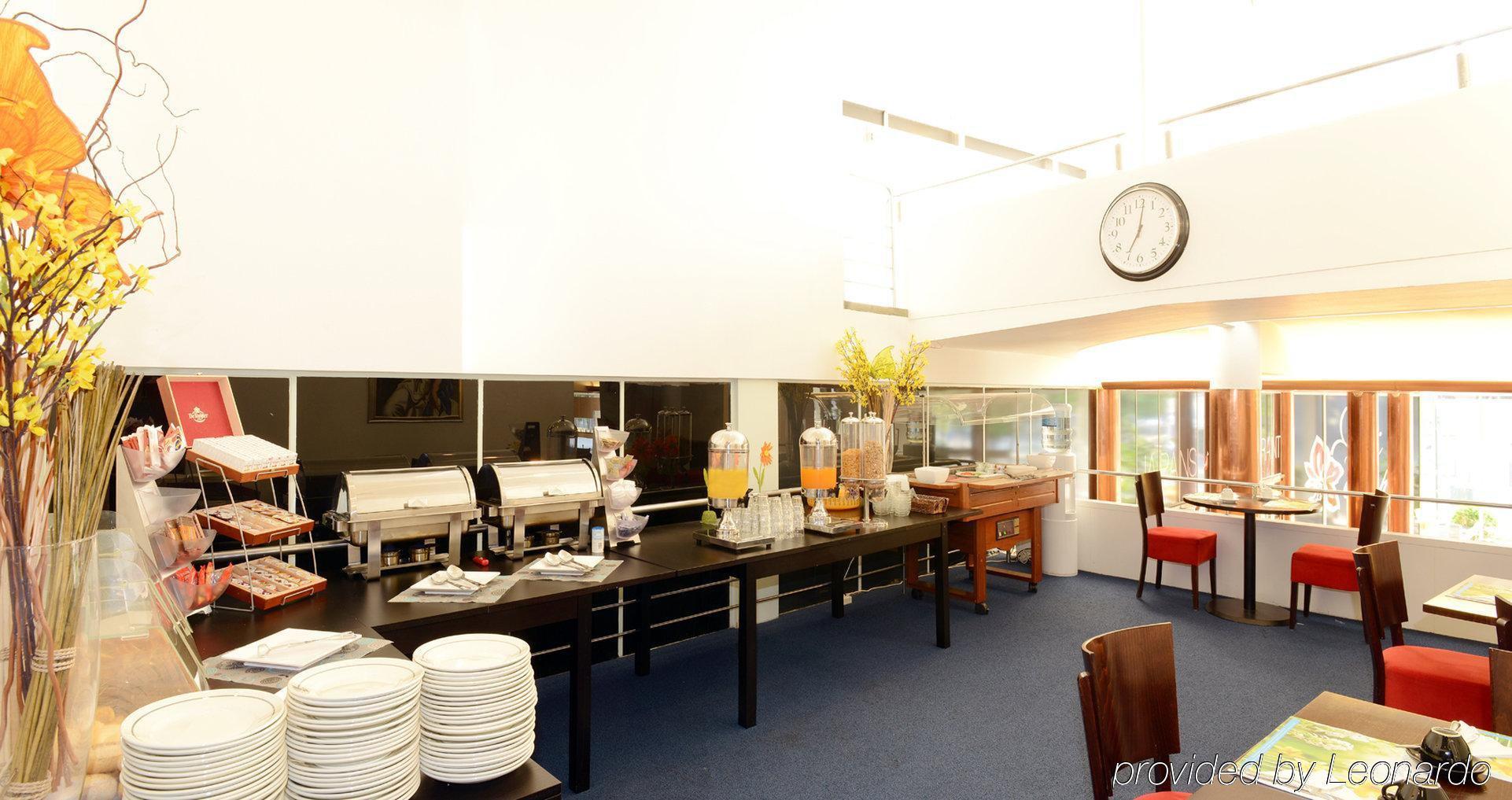 Gooiland Hotel ฮิลเวอร์ชุม ภายนอก รูปภาพ